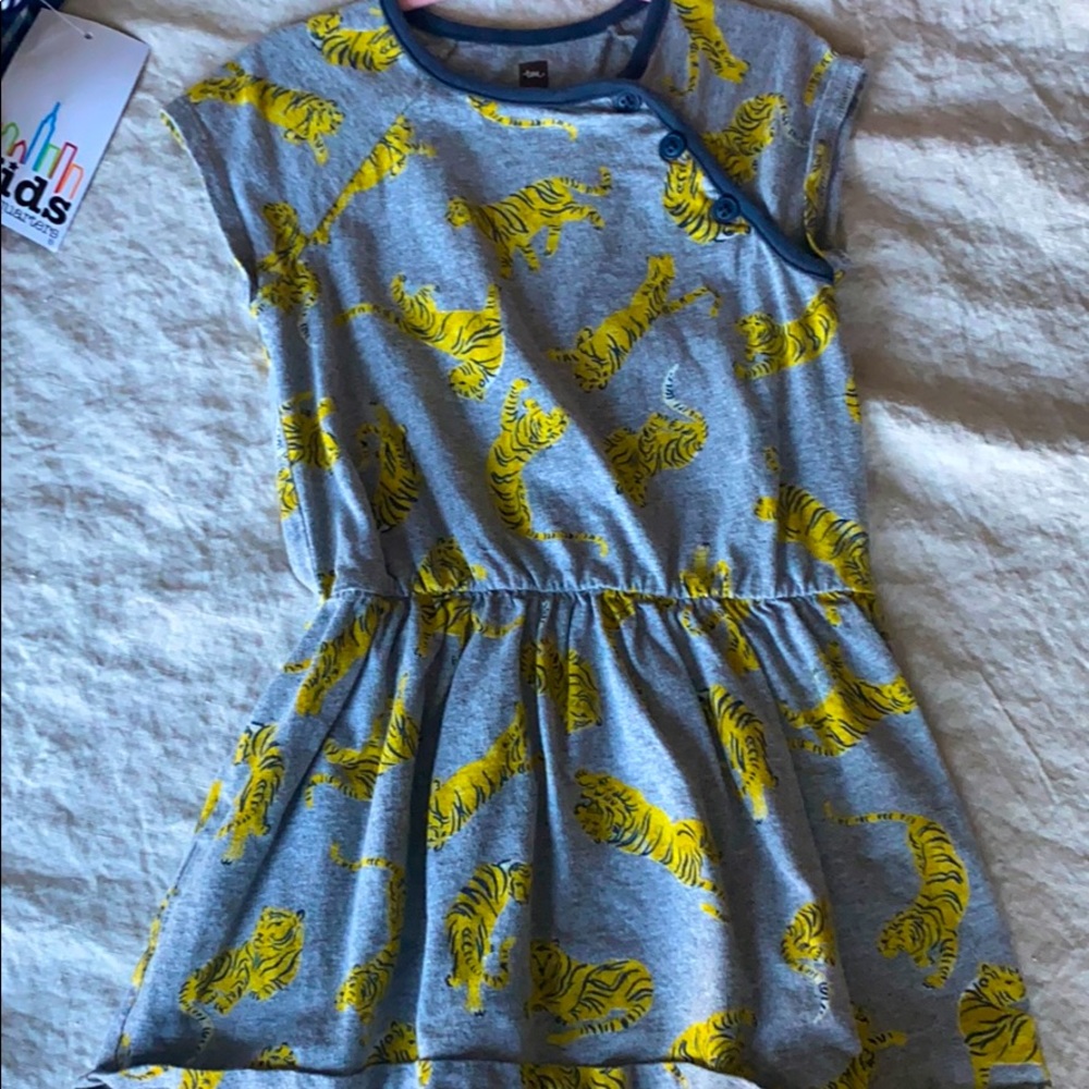 Tea Tiger Dress with a button embellishment